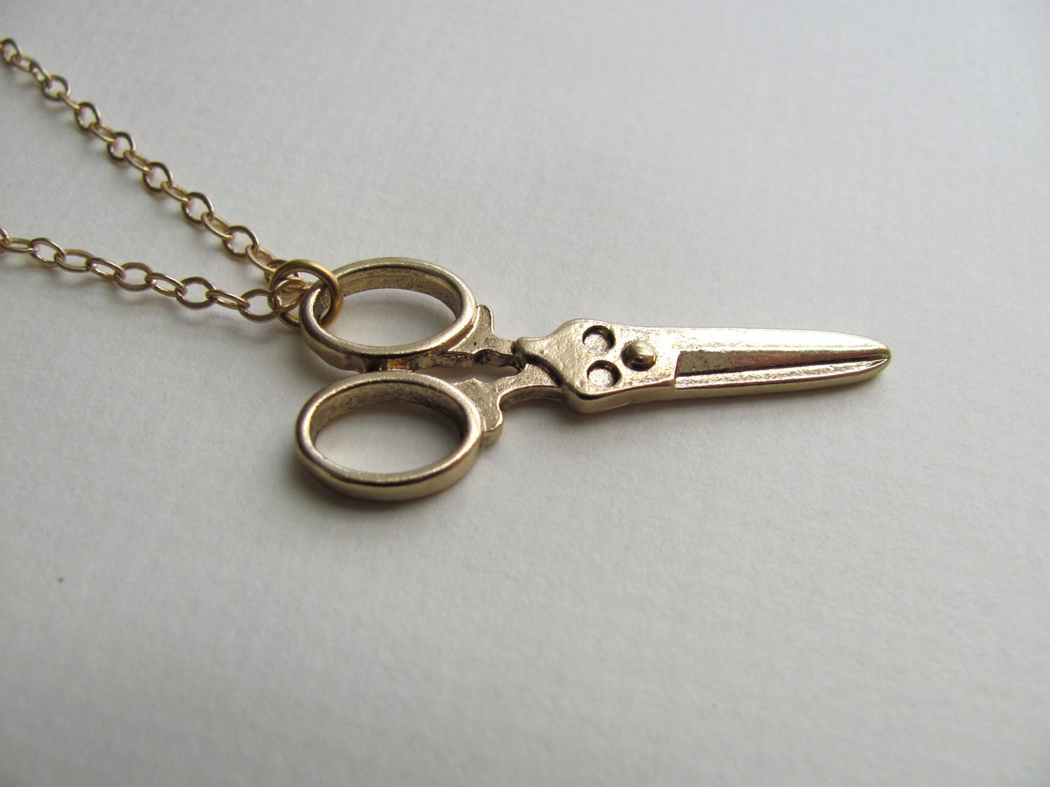 Gold scissors charm necklace on delicate 14k gold plated chain