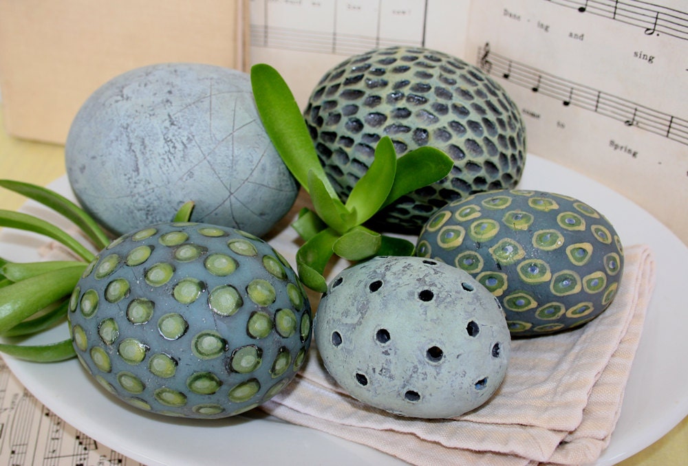 Hand built and hand painted ceramic decorations. Lots of dots. 47