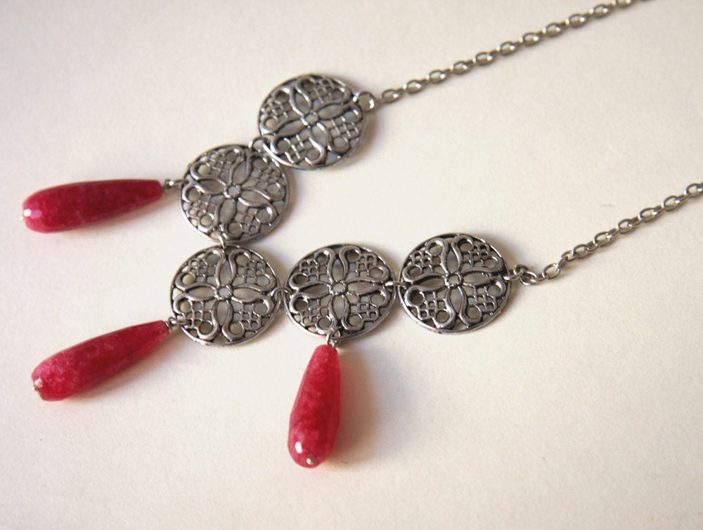hot pink and silver bib necklace - ornate silver tone metal stampings wih hot pink stone drops