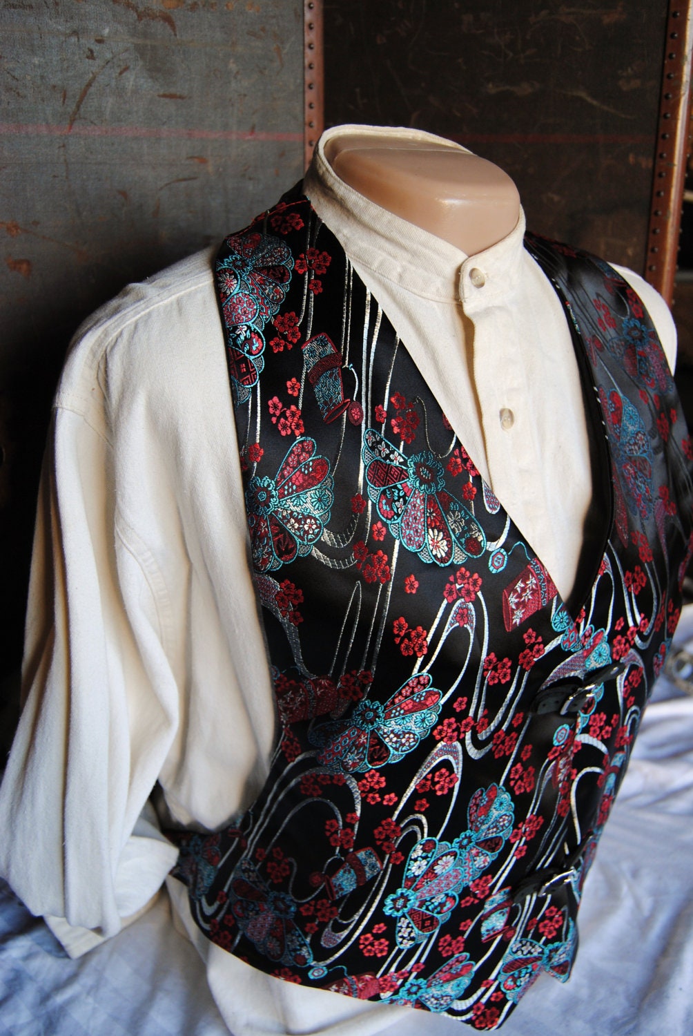 Black satin tuxedo vest with a black and blue asian motif