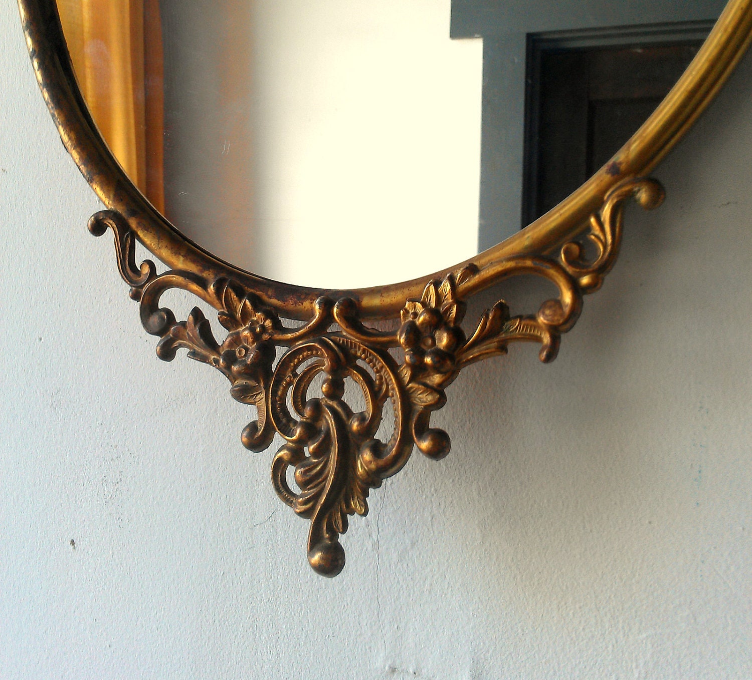 Antique Oval Mirror in Ornate Brass Frame 19 by 12 inches