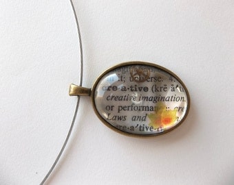 Creative Dictionary page pendant under glass with watch parts