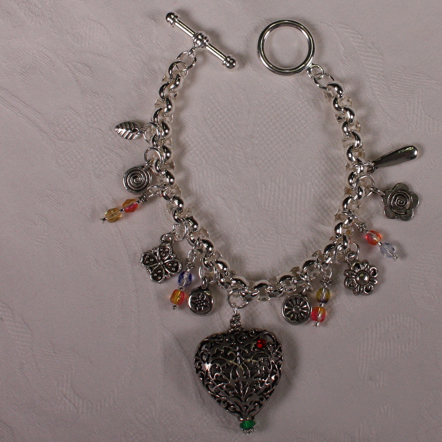 Charm Bracelet - silver linked bracelet, pewter charms, czech glass beads, 7 inches