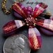 RASPBERRY JELLIE - pink, gold, violet resin & rhinestone flower pendant with suspended bead statement NECKLACE