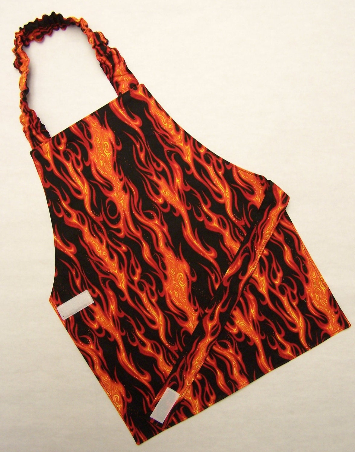 Boy flame fire bar-b-cue bar-b-que BBQ grilling tailgating Montessori apron