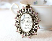 Extra long shabby french flea market style bridal necklace made from vintage sheet music with pink and purple crystals