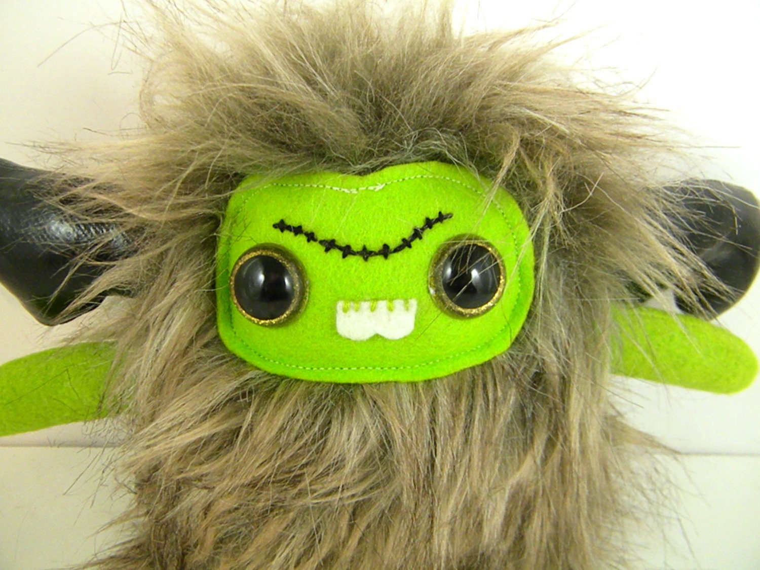 Jean-Pierre the plush monster antler brown tan lime stuffed animal