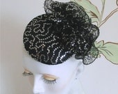 Black and silver cocktail fascinator party hat