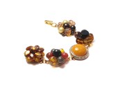 Bracelet made from vintage earrings. One of a kind and beautiful. QUEEN BEE