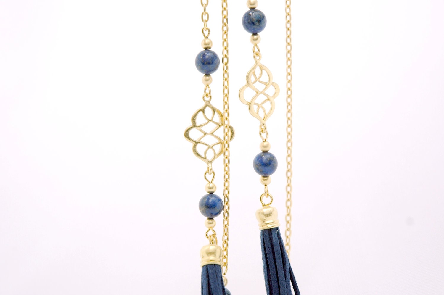Matte Gold Plated Oriental Infinity Charm Lariat Necklace with Navy blue Lapis Lazuli Stones and Suede Leather Tassel