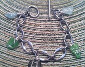 Sea Gypsy Charm Bracelet - aqua, pure green and deep sea colored glass.  Custom made to order.