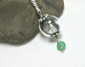 Real peacock feathers in Clear Glass Orb Necklace, with jade, silver