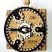 Black and Tan Planetary Gear Light Switch Plate - 8002D