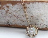 Vintage necklace, gold sphere with Iridescent beads inside, Pendant