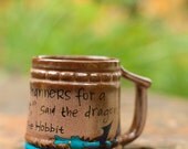 J.R.R. Tolkien "You have very nice manners for a thief and a liar" The Hobbit Quote Mug - Hand painted, Med Sm rustic brown mug with dragon
