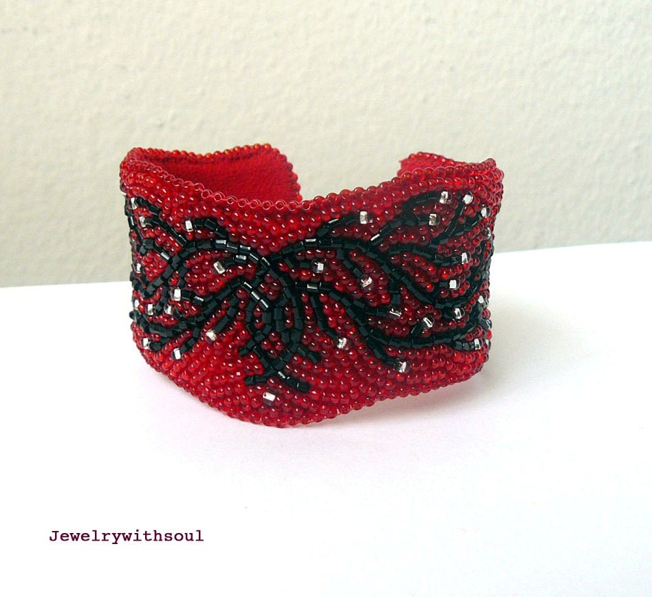 Bead embroidery cuff bracelet with cherry blossom branch twigs in scarlet coral red, jet black and silver - Embrace