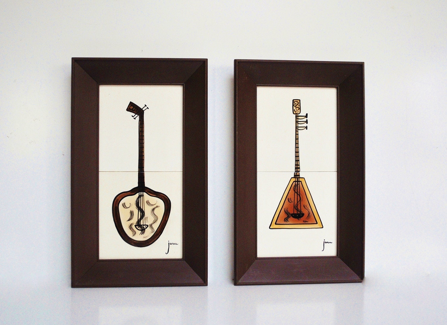 Four Mid-Century Jaru Wall Hangings - Musical Instruments