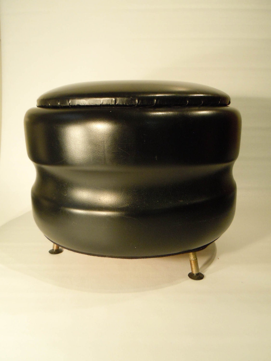Stunning shiny black pouf from the 1960s