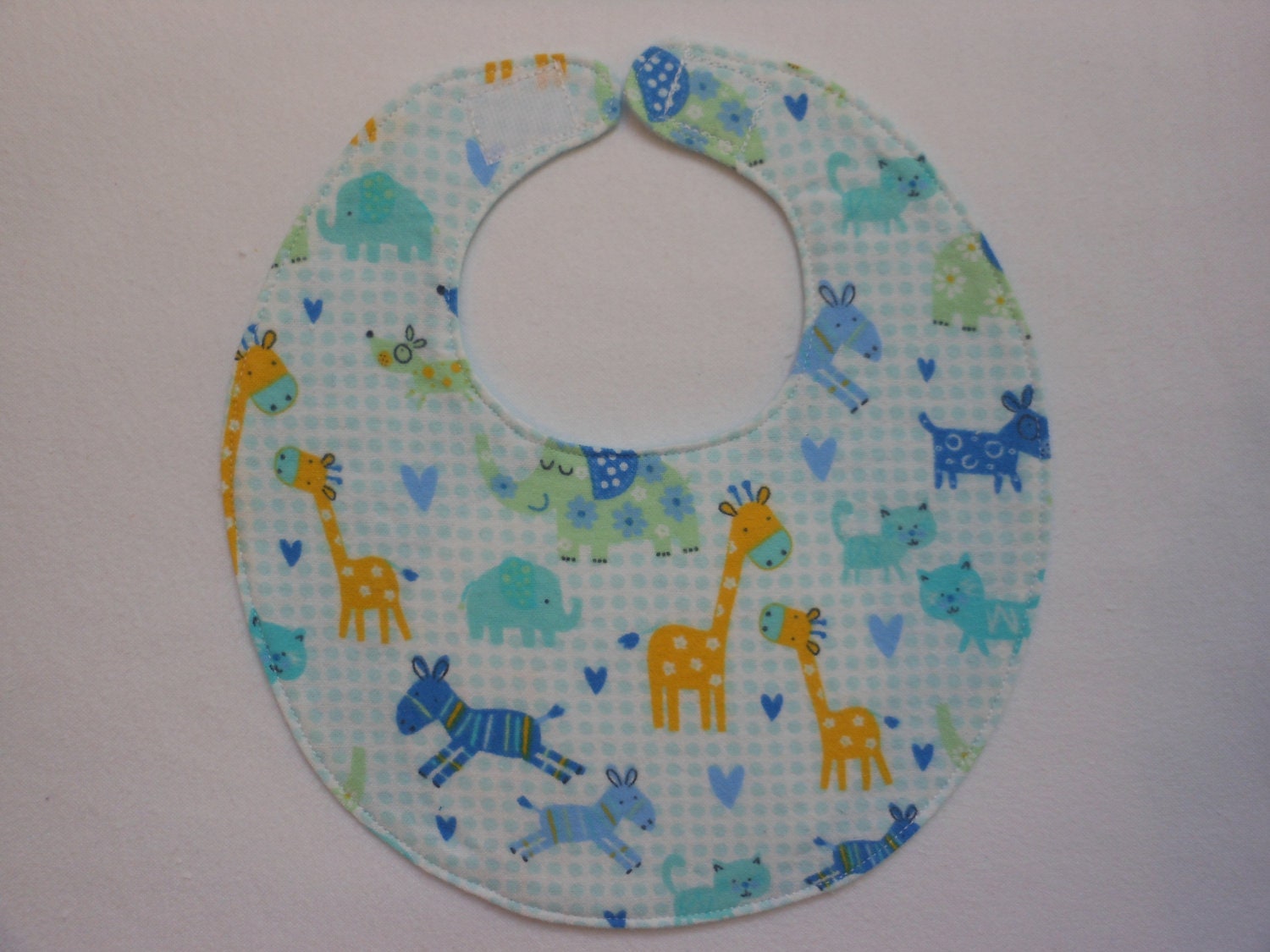 Baby Bibs, four soft layers, reversible, blue gingham with giraffes, and zebras, and elephants