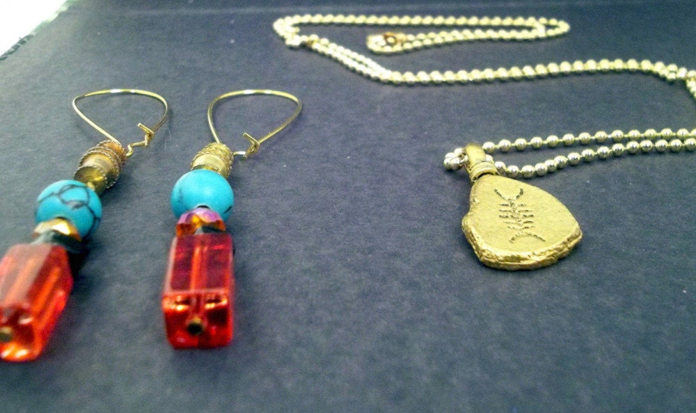 Golden fish bone "fossil" slab, golden ball chain necklace, earrings in tangerine glass and crystal, turquoise howlite:Golden Bone