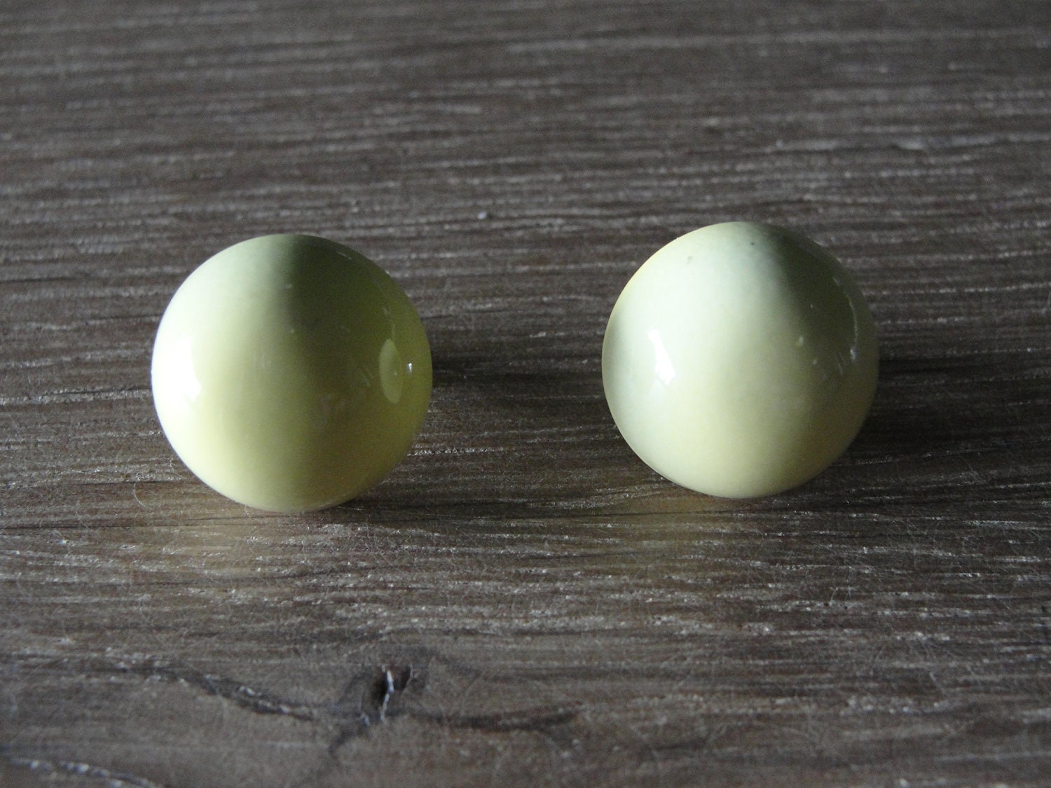 Vintage 1960s Light Yellow Enameled Dome Clip On Earrings
