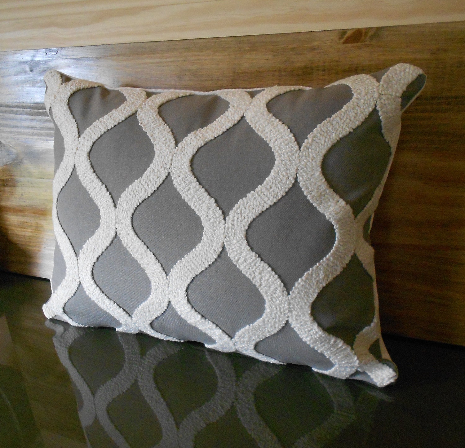 Gray and cream tufted trellis lumbar throw pillow