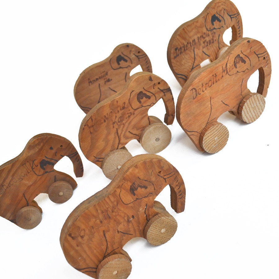 1930's wooden elephant toy souvenir choose from 4 remaining cities  offered by Elizabeth Rosen
