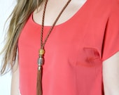 Fabric Tassel Necklace. Bronze roping and tassel featuring vintage curtain findings and unique beads. Easy to wear style