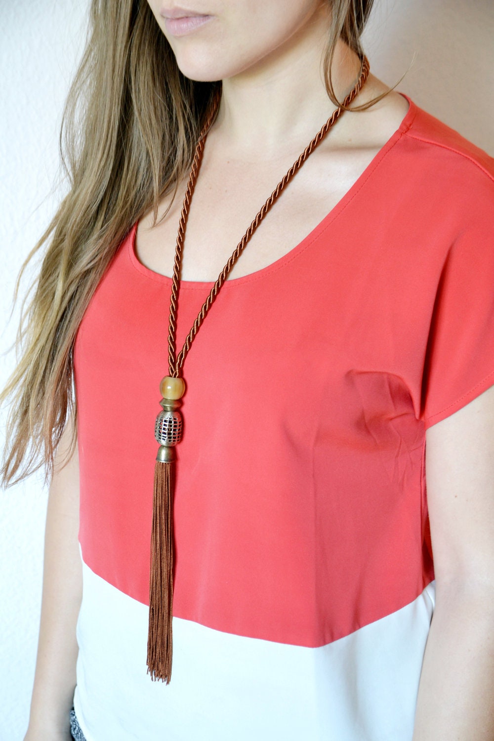 Fabric Tassel Necklace. Bronze roping and tassel featuring vintage curtain findings and unique beads. Easy to wear style