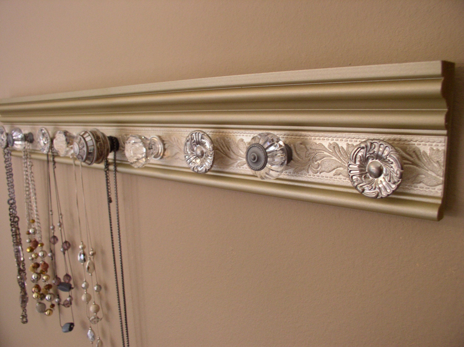 jewelry holder organizer with 9 decorative cabinet knobs on metallic champagne beveled wood with embossed champagne 26 inches
