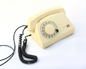 Vintage rotary telephone creamy