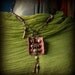 Leather and bead amulet necklace - tribal glass beads, gold coral and raw sapphire
