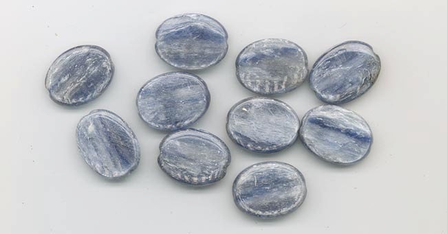 Ten gorgeous high-quality kyanite beads - lots of silvery grey and blue shimmer - 20 x 15 mm flat ovals
