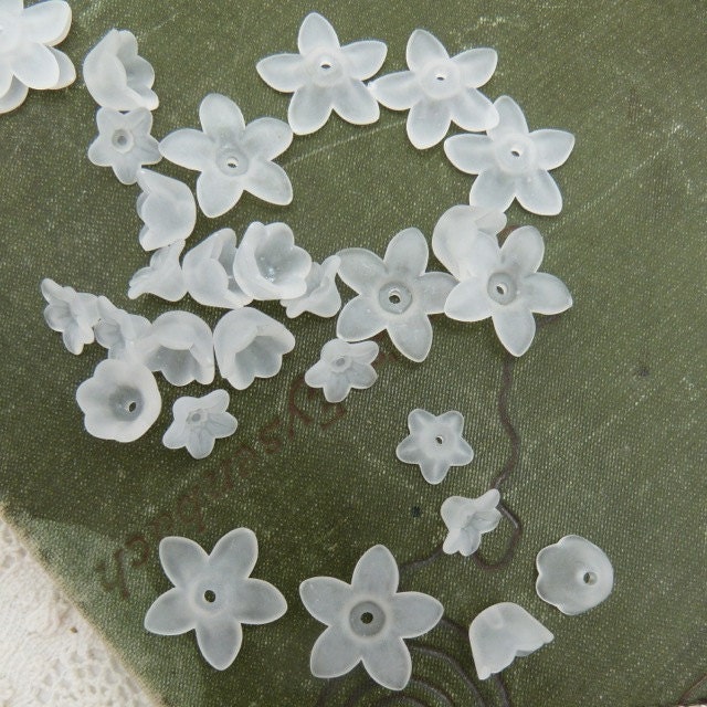 30 white lucite flower beads in 3 styles you will  receive 10 sm 9 mm x 5 mm 10 tulip 6 mm x 10 mm 10 star 16 mm x 4 mm