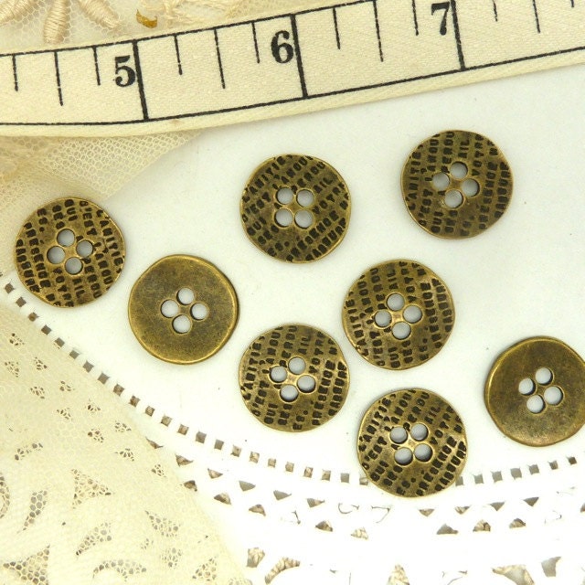 8  anitque finish  metal  bronze  buttons with script image embossed surface  18 mm round