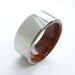 Wood and Titanium ring -- Rosewood interior with polished Titanium exterior