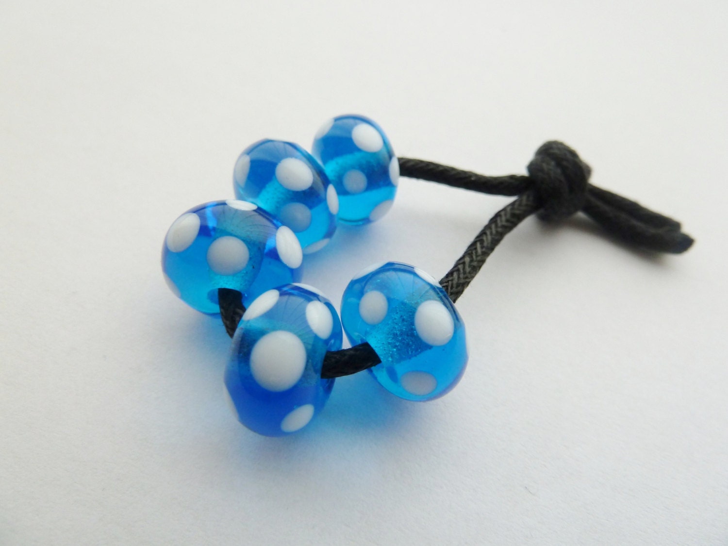 handmade lampwork glass beads, turquoise spots
