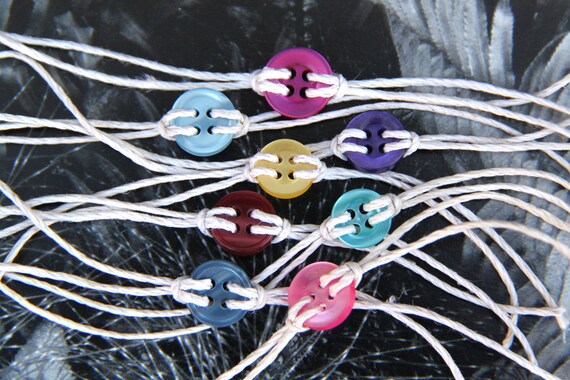 Cute as a button bracelet in SHINY colors.