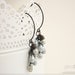 Earrings wire wrapped with antique brass wire with blue czech glass picasso drop beads.