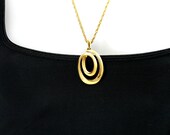 Vintage necklace Crown Trifari gold tone oval circles 27 inches