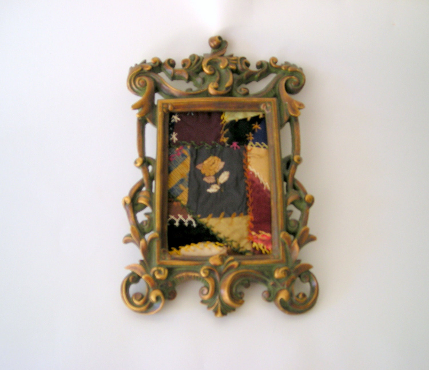 Crazy quilt block in frame