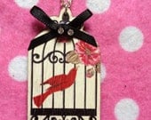 Red Bird In Cage With Pink Flowers Wooden Pendant Necklace