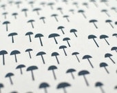tiny forest in storm on bone quilting cotton handprinted fabric panel french navy blue