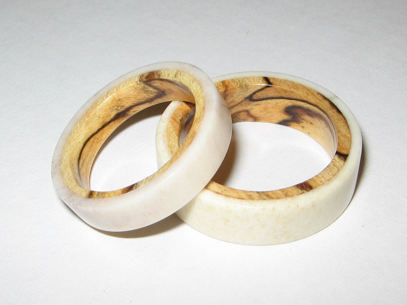Matching Pair of Antler and Wood Lined Rings