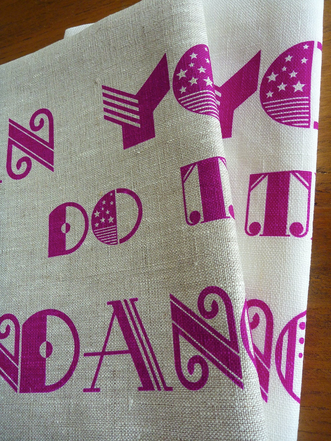 Scaramouche Scaramouche tea towel in Purple on Natural
