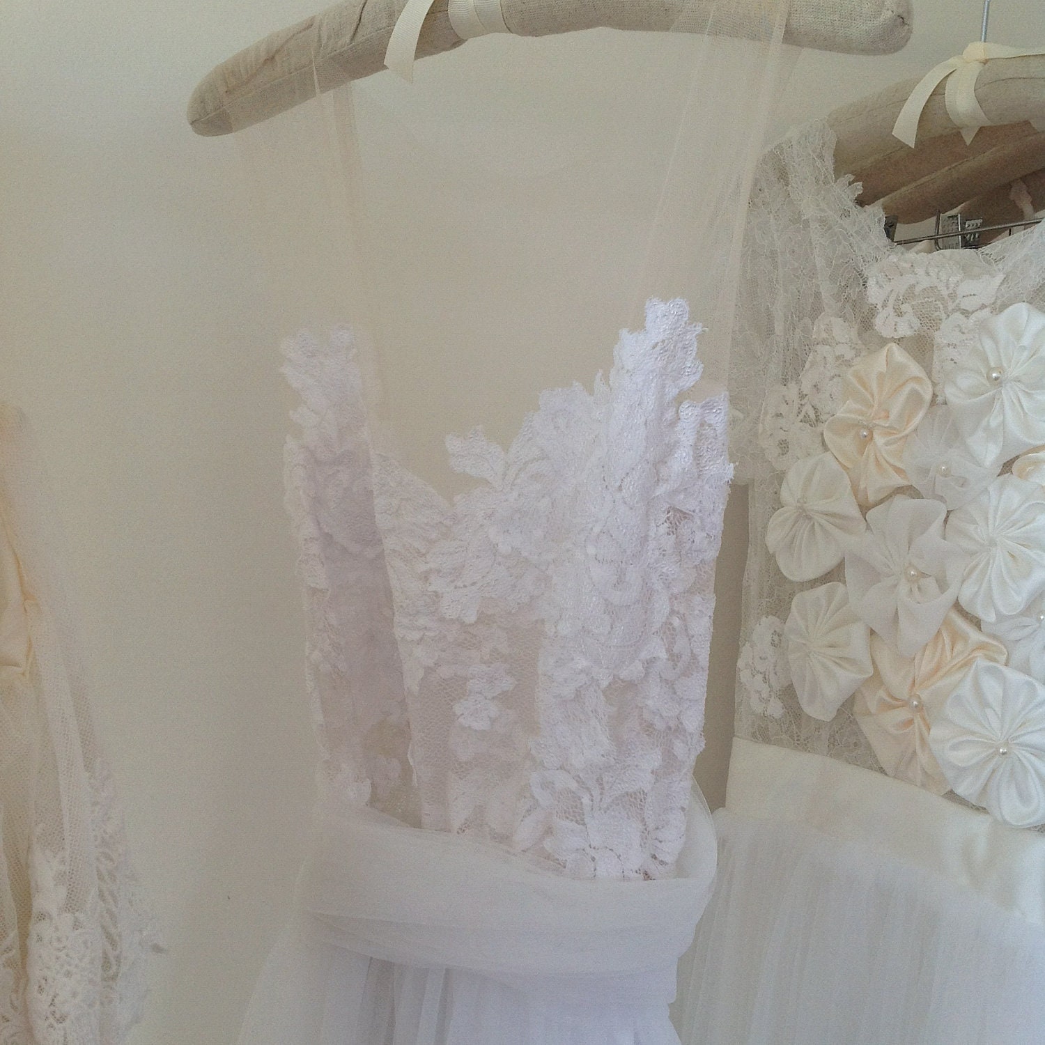 Magical white lace wedding dress with soft tulle skirt and invisible neck line