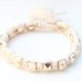 Arm candy - Gold pyramid beads and White cord - woven bracelet