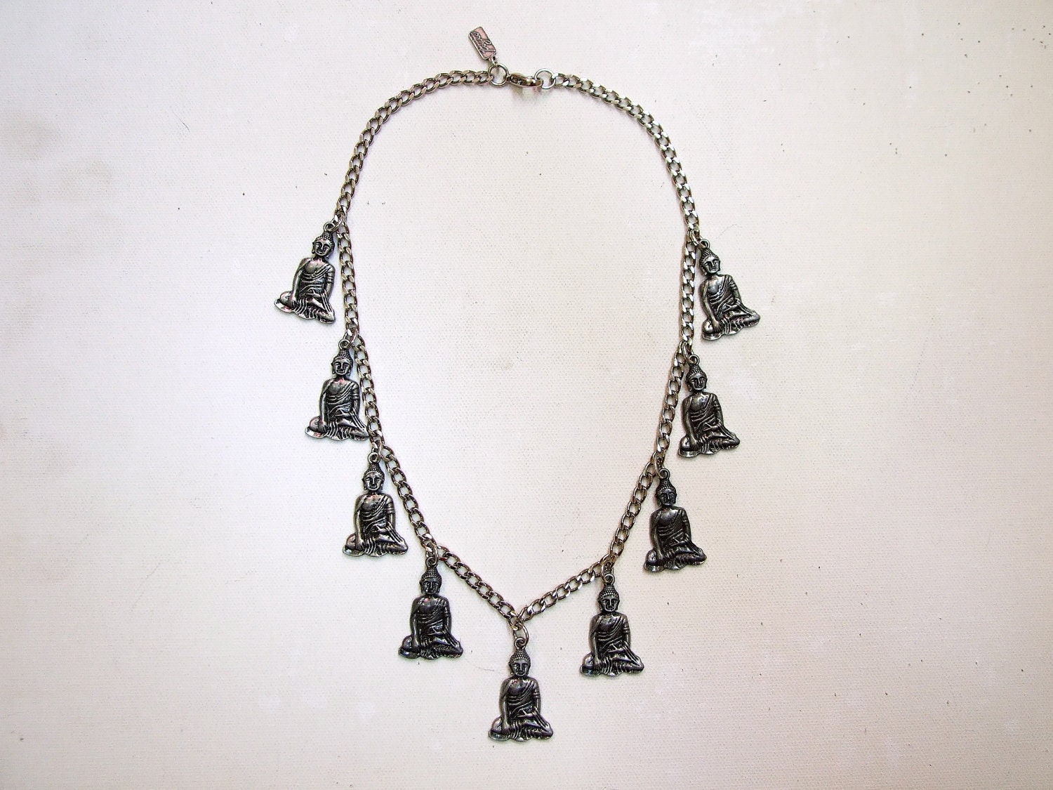 Floating Buddha Charm Necklace.