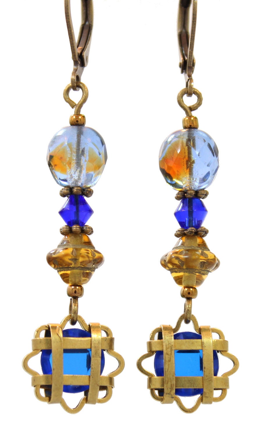 Antiqued brass filigree earring with vintage blue beads and antique cathedral bead.