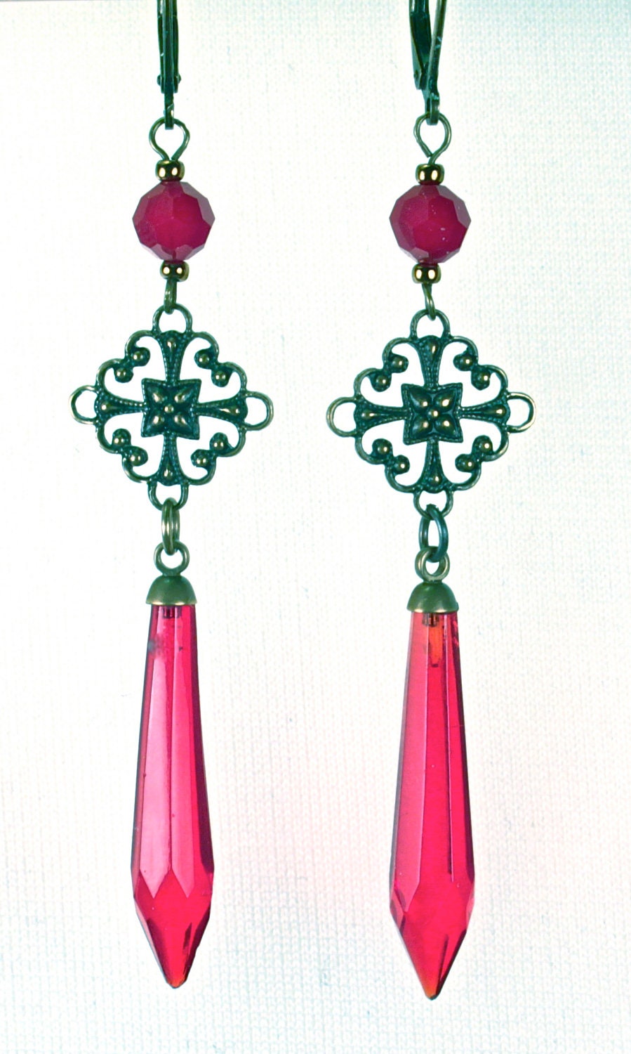 Antique chandelier red crystal earrings with stunning brass filigree on antique brass lever backs.